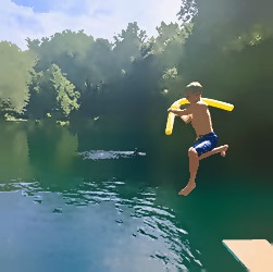 Boy jumping off diving board at Maple lake.